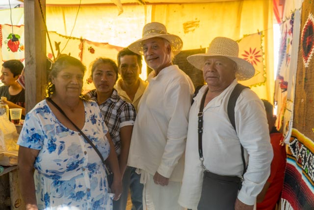 Our staff Alda, George, and Alejandro with a local vendor.